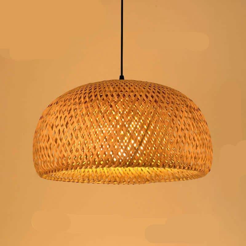Rustic round handwoven rattan pendant light – shown lit