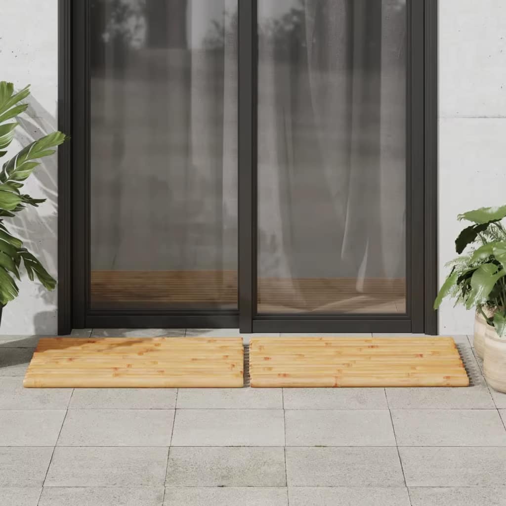 Set of two natural beige bamboo rugs – shown in a room setting