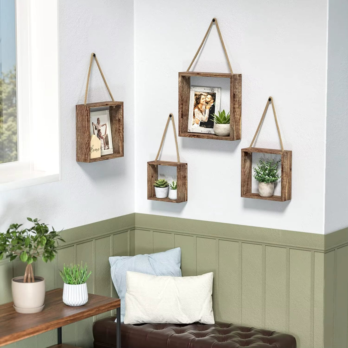 Set of four square wooden displays hung on natural rope – shown in a room setting