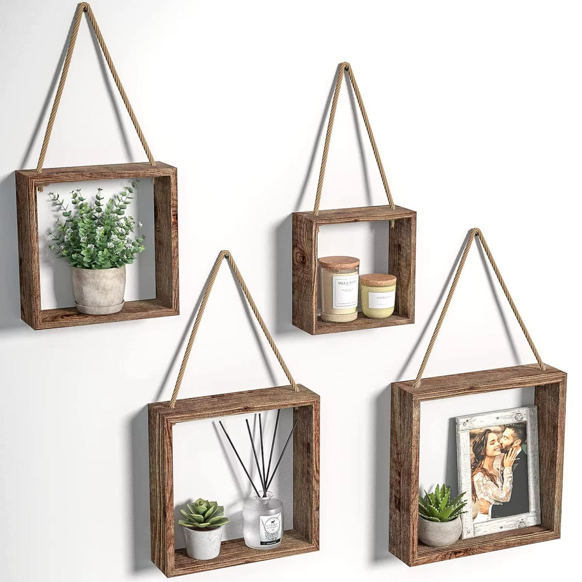 Set of four square wooden displays hung on natural rope – shown in a room setting (2)