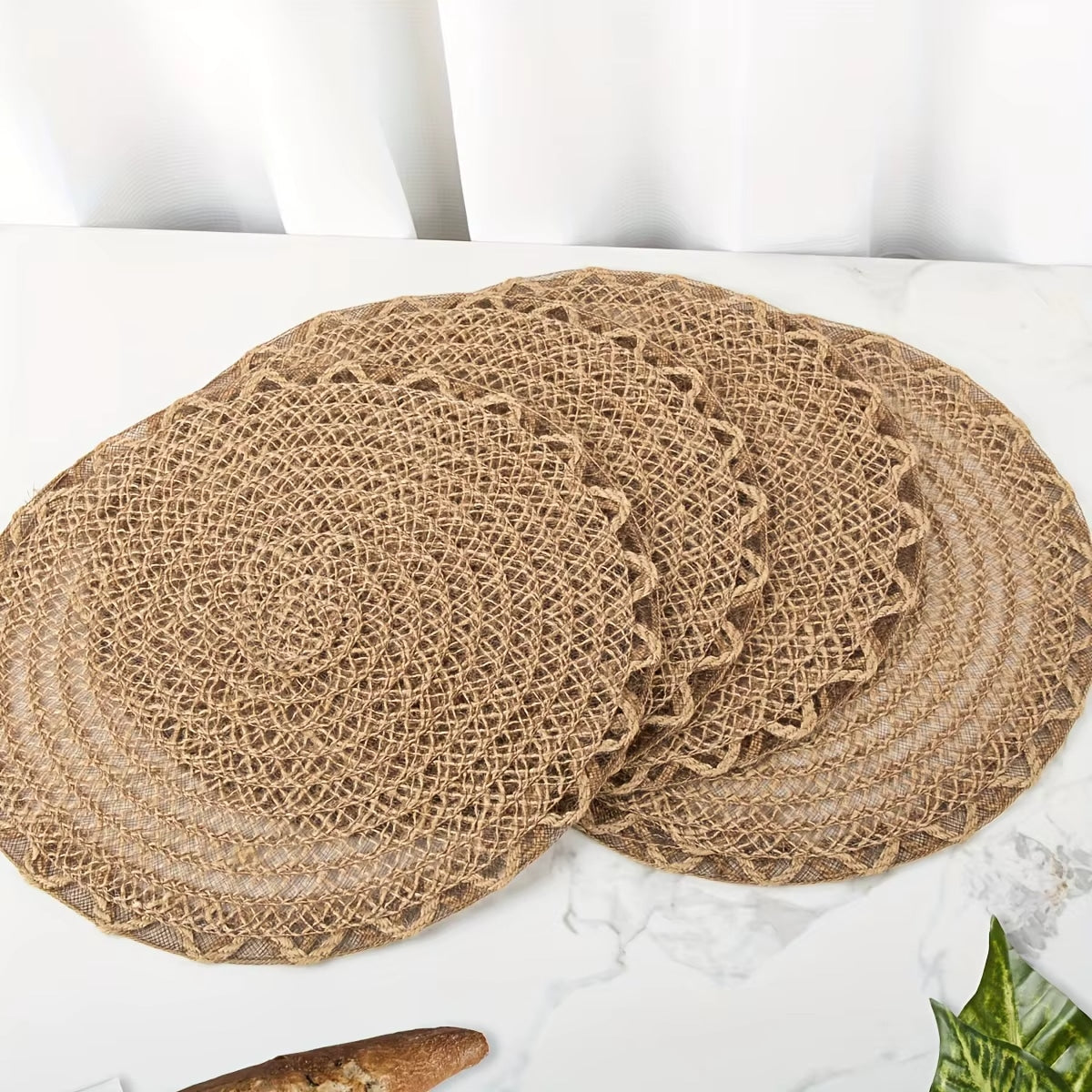Set of four scalloped straw-look placemats in warm beige