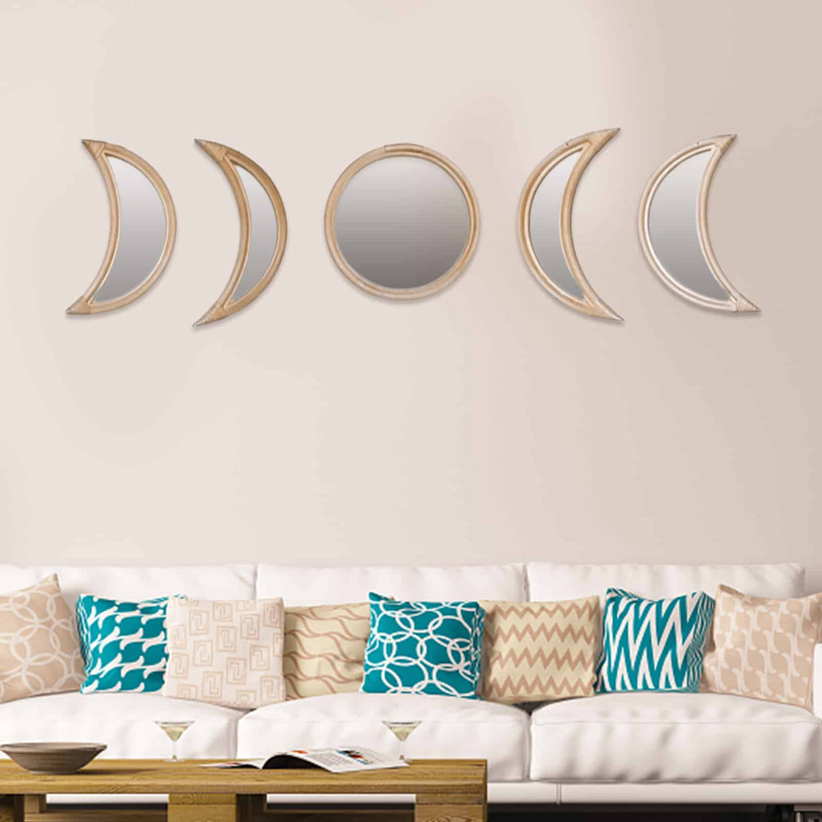 Set of three round rattan mirrors in graduated sizes – shown in a room setting