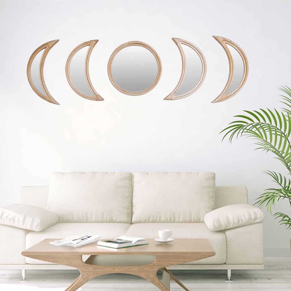 Set of three round rattan mirrors in graduated sizes – shown in a room setting (2)