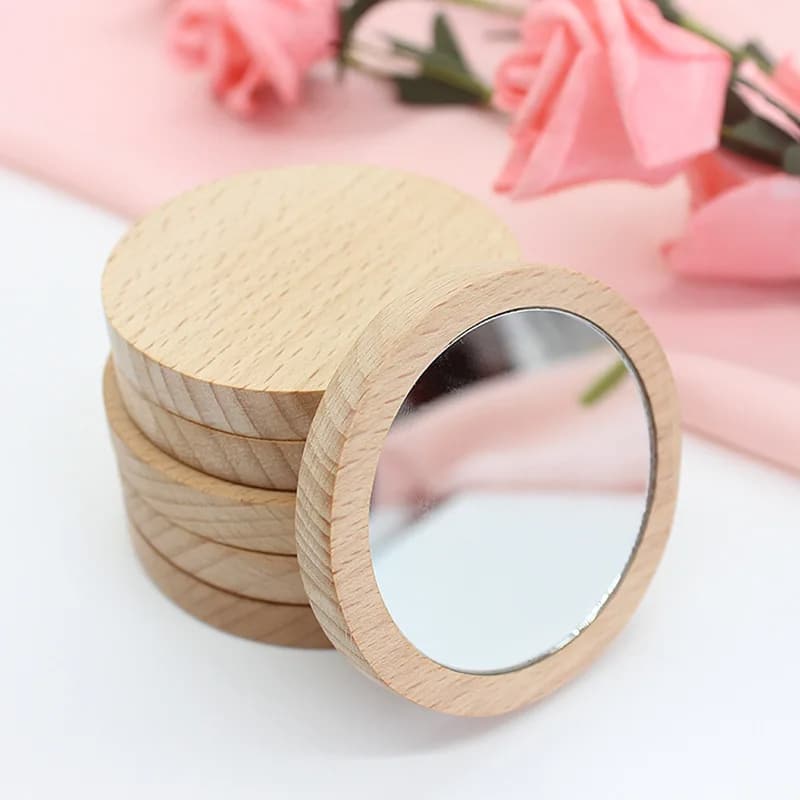 Set of ten round wooden pocket mirrors