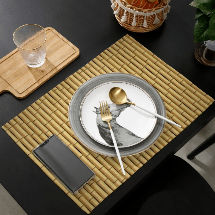 Set of four bamboo-look patterned placemats – shown in a room setting (2)