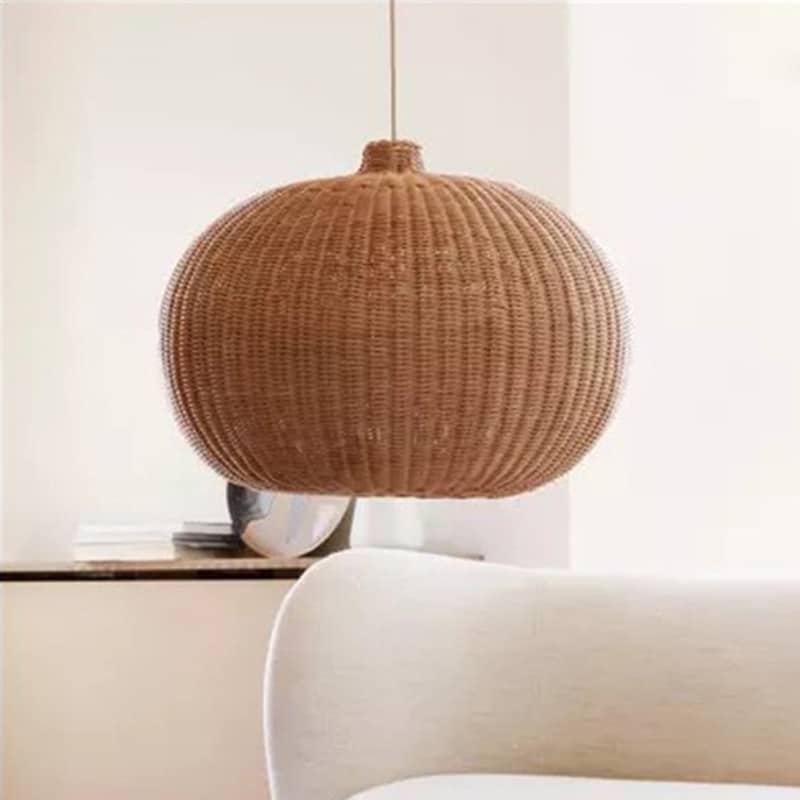 Chinese village-style handmade rattan and wicker ball pendant light – shown in a room setting (3)