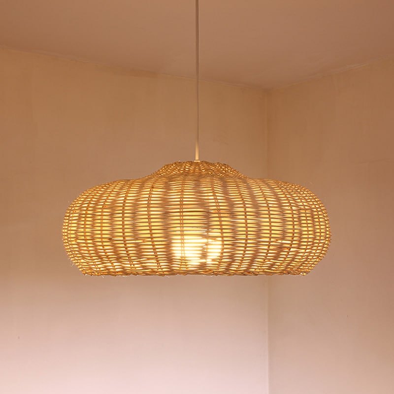Chinese village-style flat disc rattan and wicker pendant light – shown lit