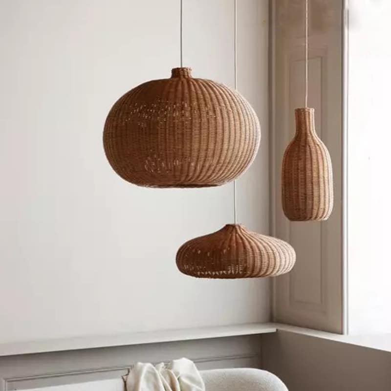 Chinese village-style flat disc rattan and wicker pendant light – shown in a room setting