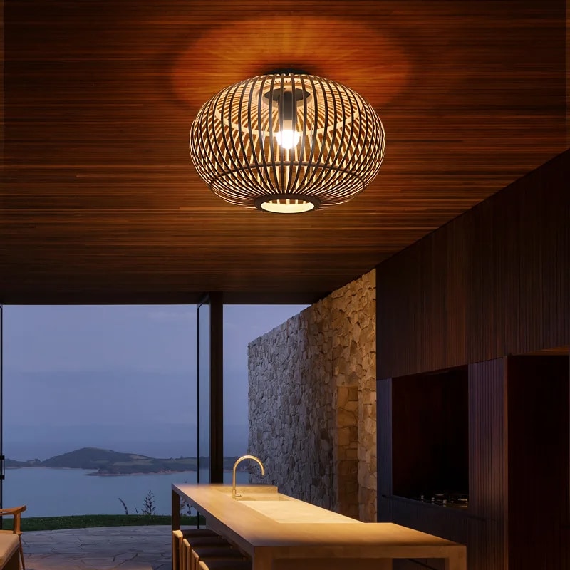 Japanese-style hand-assembled bamboo chandelier – shown lit in a room setting