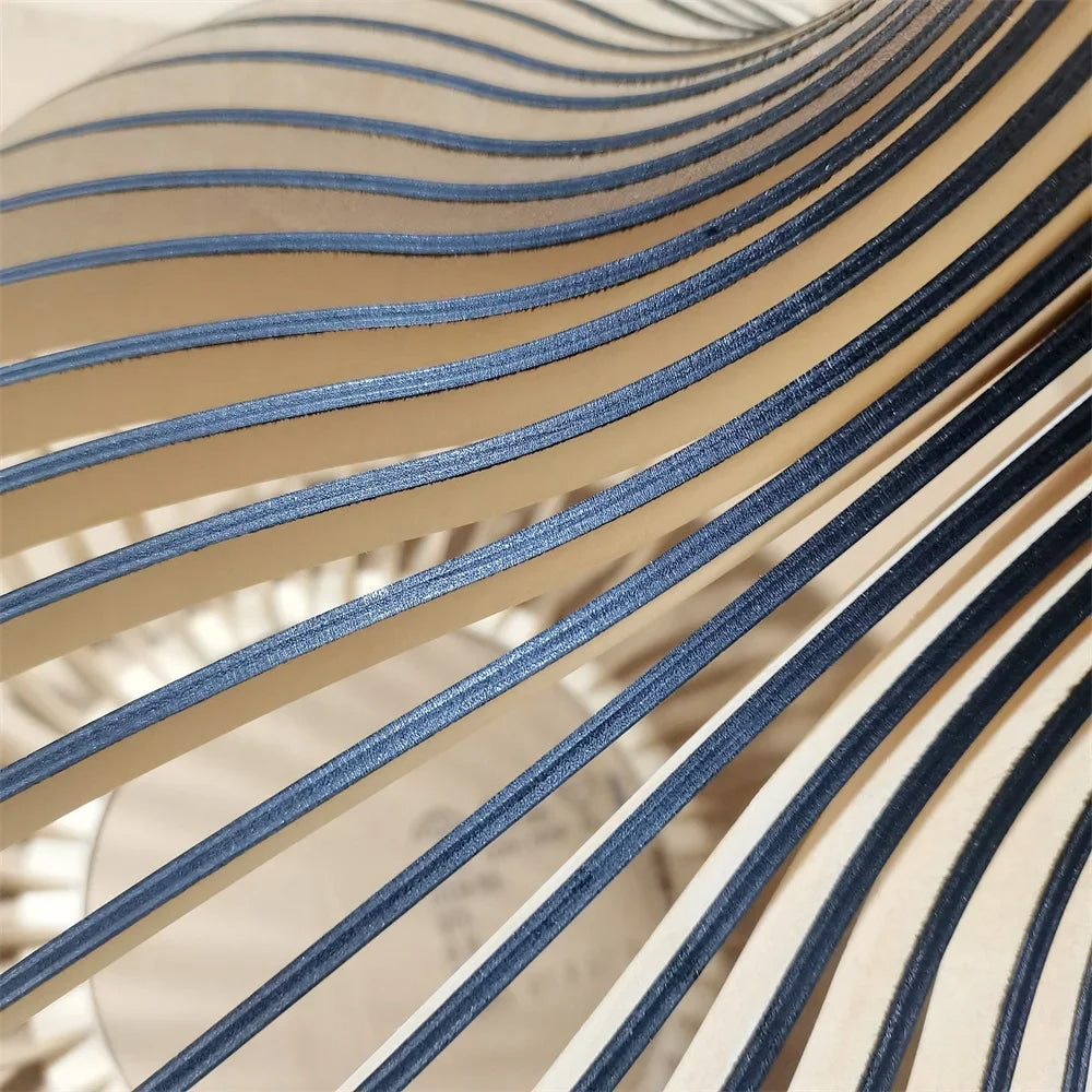 Modern light wood slat LED chandelier with a fine metal frame – close-up detail