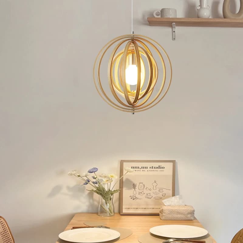 Japanese-style rotating chandelier with concentric natural wood slats – shown in a room setting (2)