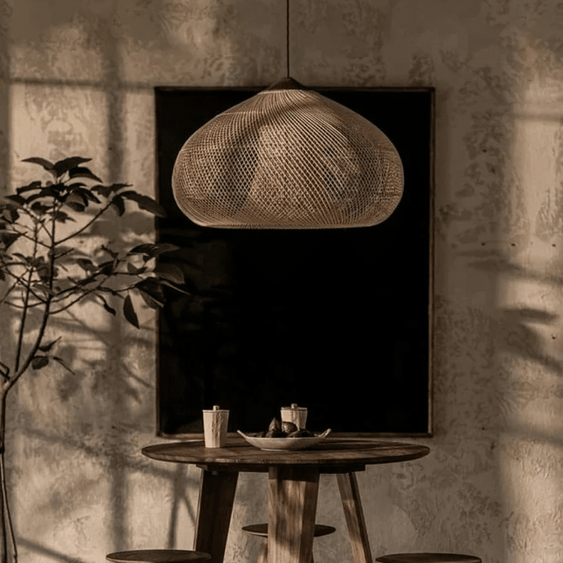 Japanese honeycomb woven straw-look chandelier – shown lit in a room setting