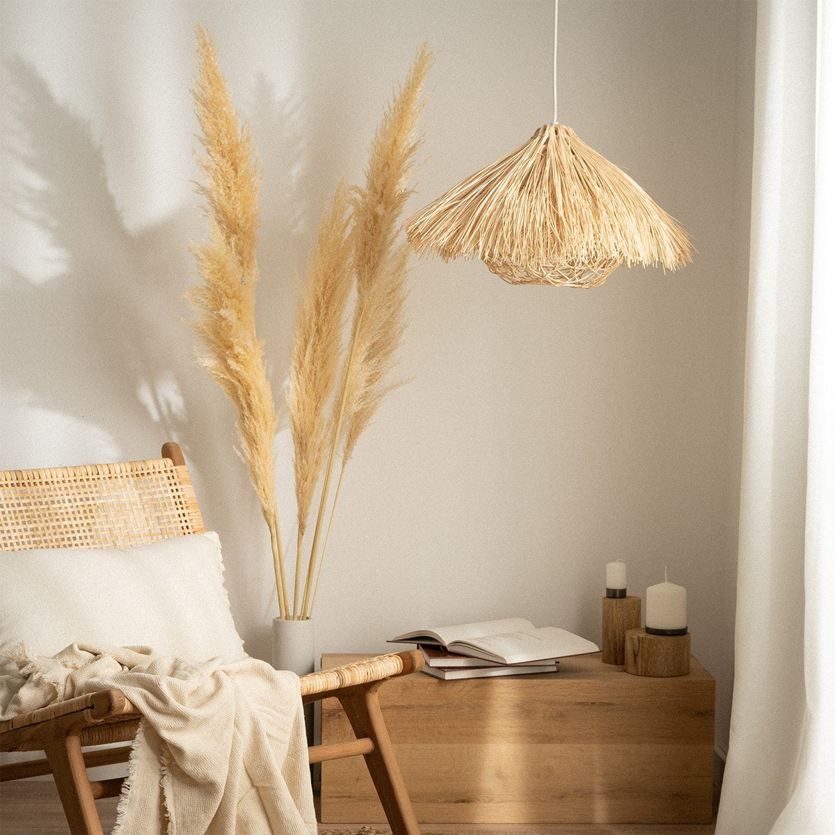 Round yellow bamboo and wood chandelier with an open circular structure – shown in a room setting