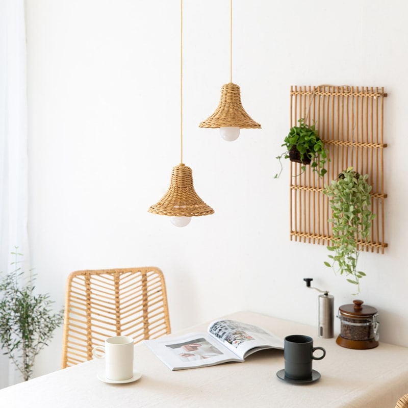 Antique-style Chinese rattan dome chandelier with a patinated finish – shown in a room setting