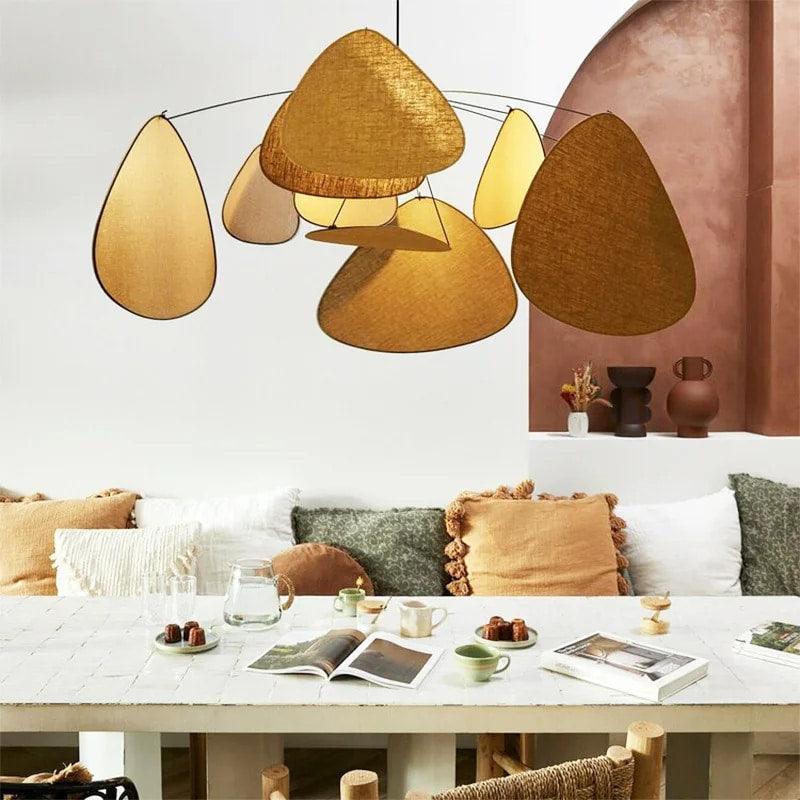 Floating fabric petal chandelier with layered petals – shown in a room setting (3)