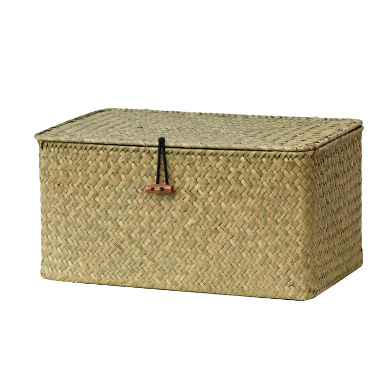 Patinated rattan trunk with visible hardware and a fitted lid