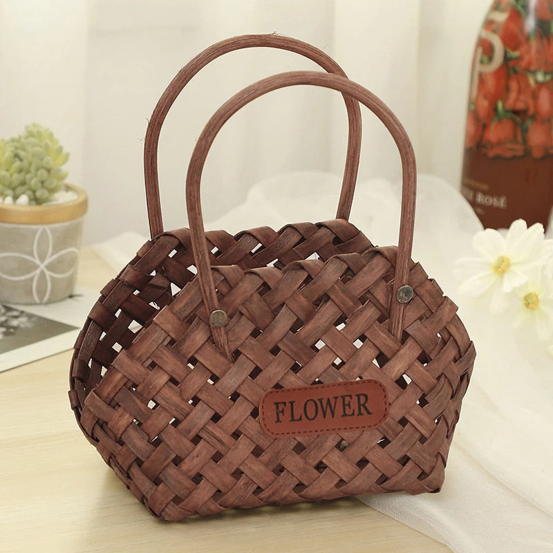 Mini woven flower basket with painted florals and brown fabric lining – another view