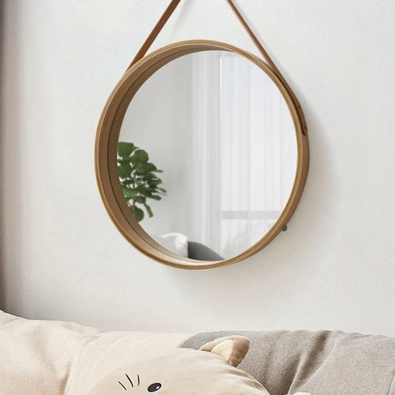 Round wooden mirror with a thick, grained border – shown in a room setting (2)