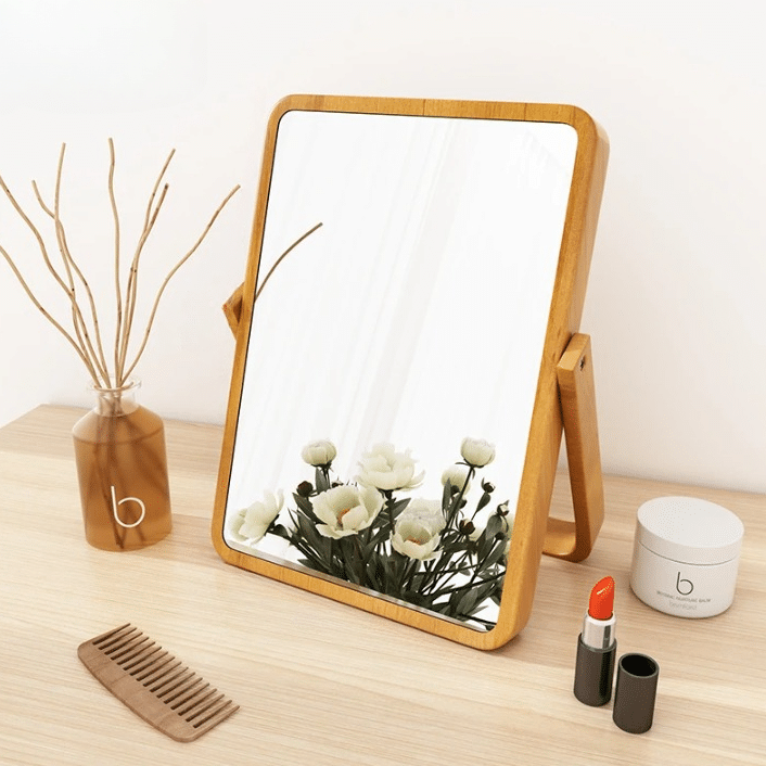 Square vintage-style wooden mirror on a tilting stand – shown in a room setting