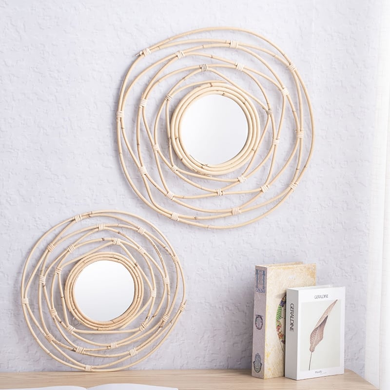 White handwoven rattan decorative mirror – shown in a room setting