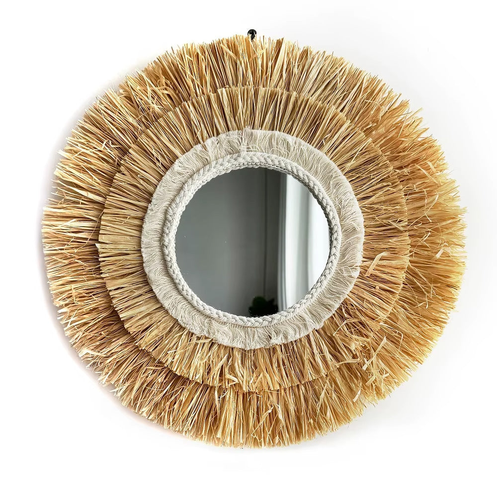 Circular natural straw mirror with an evenly woven frame