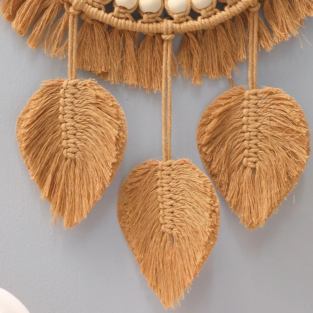 Round mirror with a braided rattan frame and cotton macramé fringe – close-up detail (2)