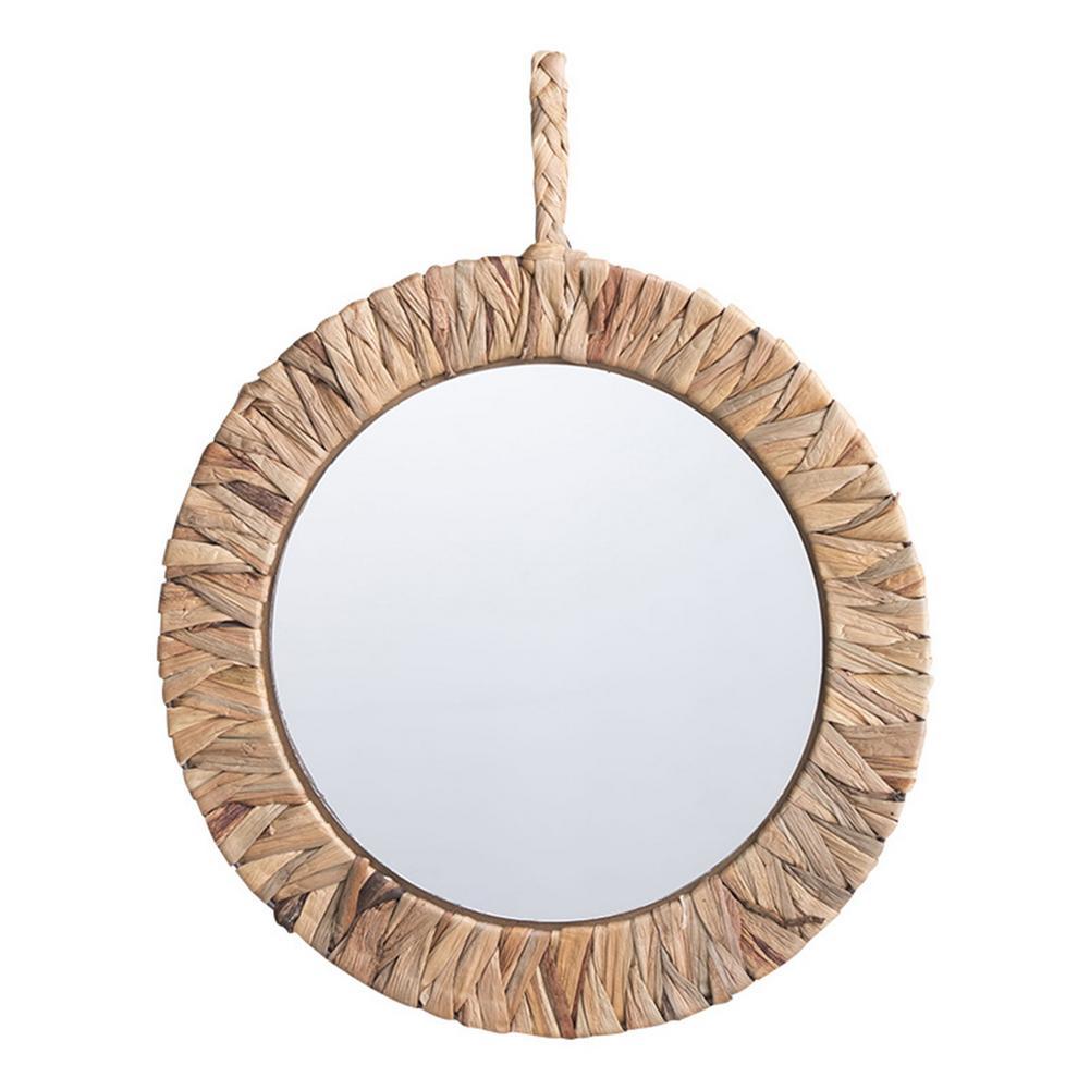 Natural rattan sun mirror with rays radiating from a circular frame