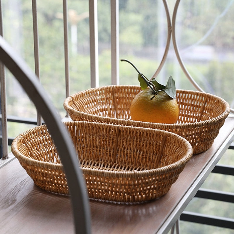 Oval faux rattan kitchen storage basket – shown in a kitchen (2)