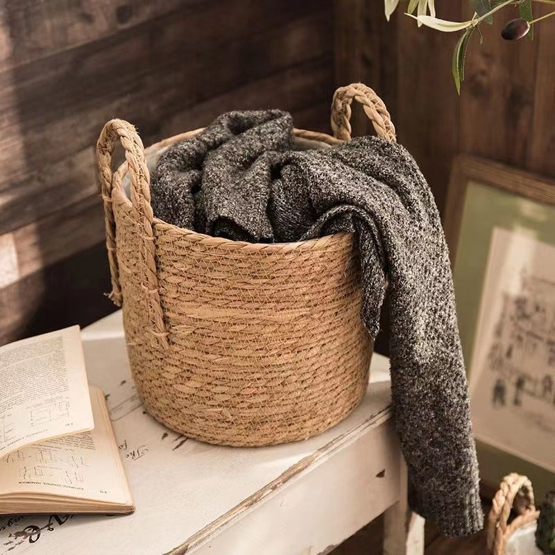Open-weave natural wicker basket for garden, flowers or laundry – shown in a room setting (4)