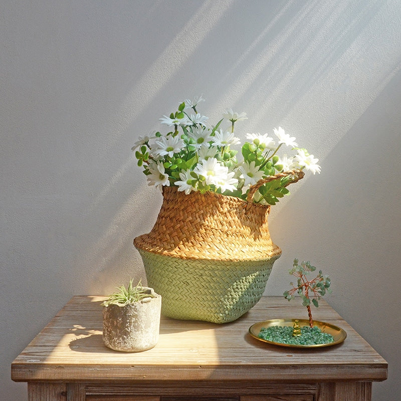 Boho two-tone foldable rattan storage basket with handles – shown in a room setting