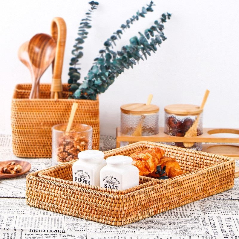 Rectangular handwoven rattan storage basket – shown in a room setting (2)