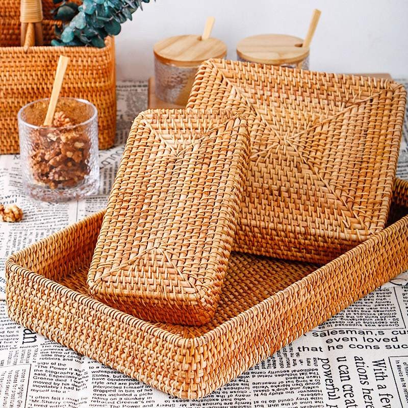 Rectangular handwoven rattan storage basket – shown in a room setting