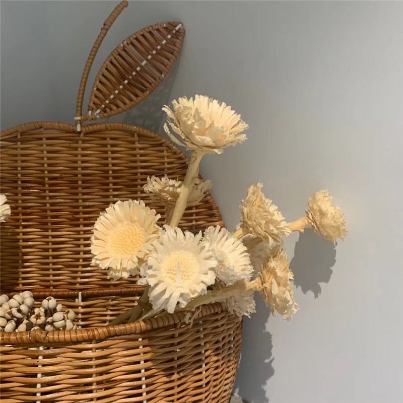 Vintage apple-shaped rattan nursery basket – shown in a room setting (2)