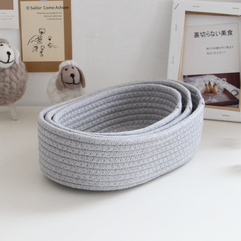 Gray oval woven cotton rope storage basket – multiple views