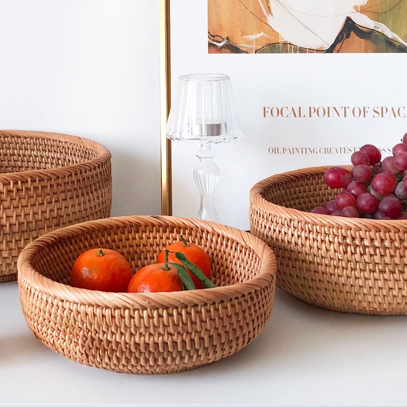 Round handwoven rattan pantry basket – shown in a room setting