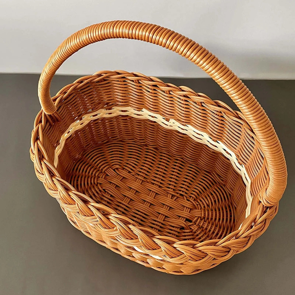 Wicker-look basket with a fine white trim along the rim – another view