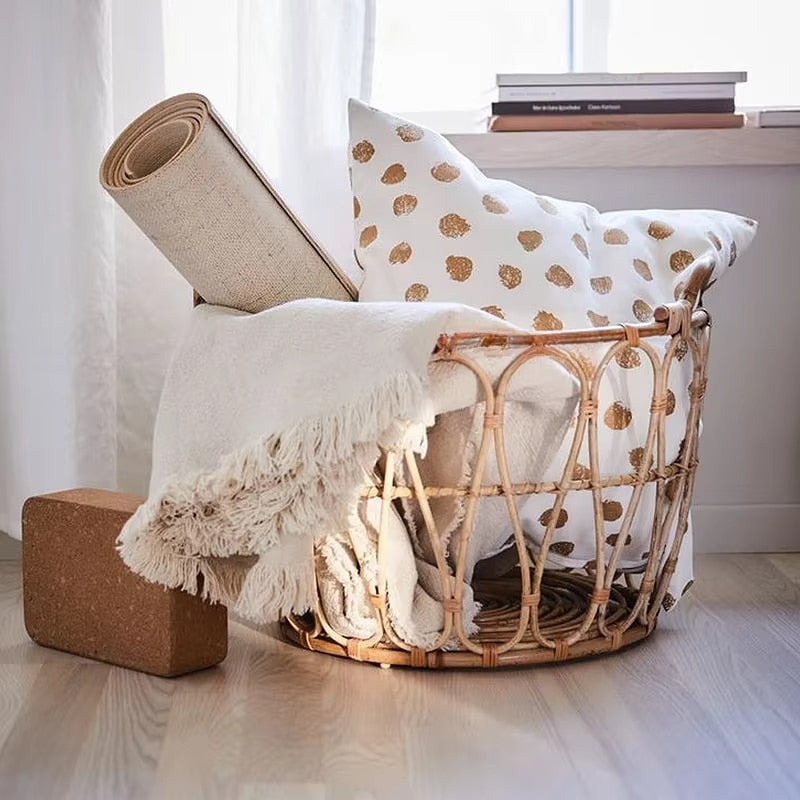 Open natural rattan laundry basket with an airy structure – shown in a room setting (2)