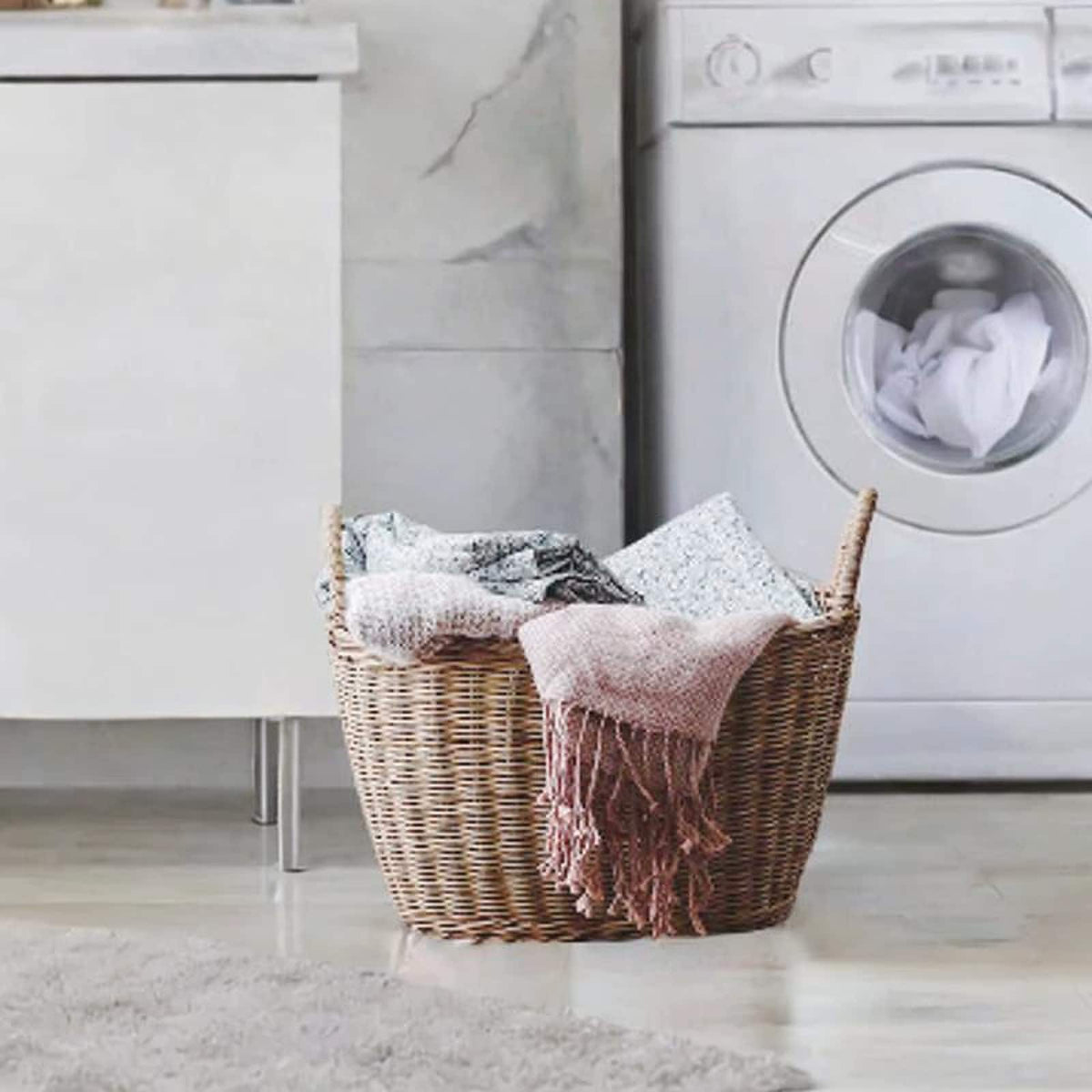 Sturdy vintage rattan laundry basket with a flared, ribbed silhouette – shown in a room setting (3)