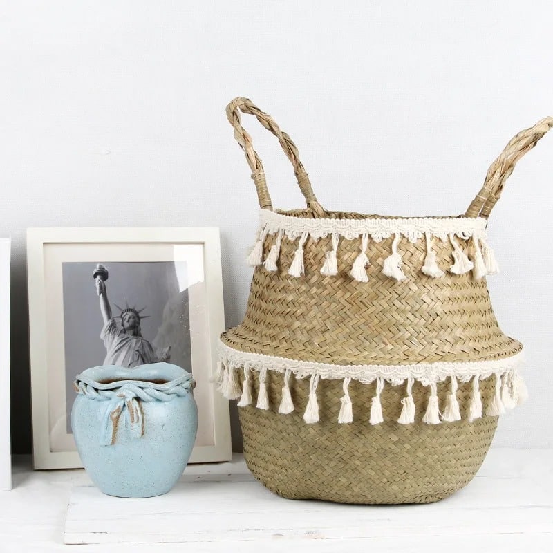 Natural handwoven wicker basket with a slightly golden raw finish – shown in a room setting