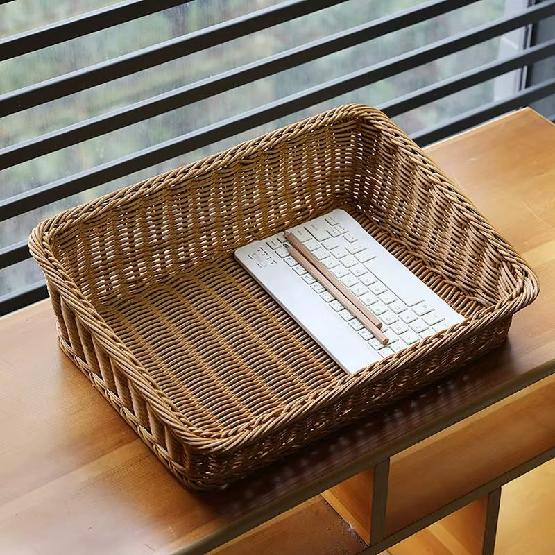 Slim rattan-look storage basket in a natural tone with brown highlights – close-up detail