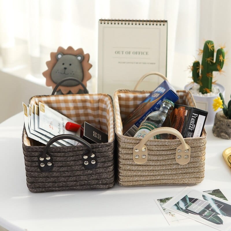 Square hand-braided rattan box basket with two handles – shown in a room setting (4)