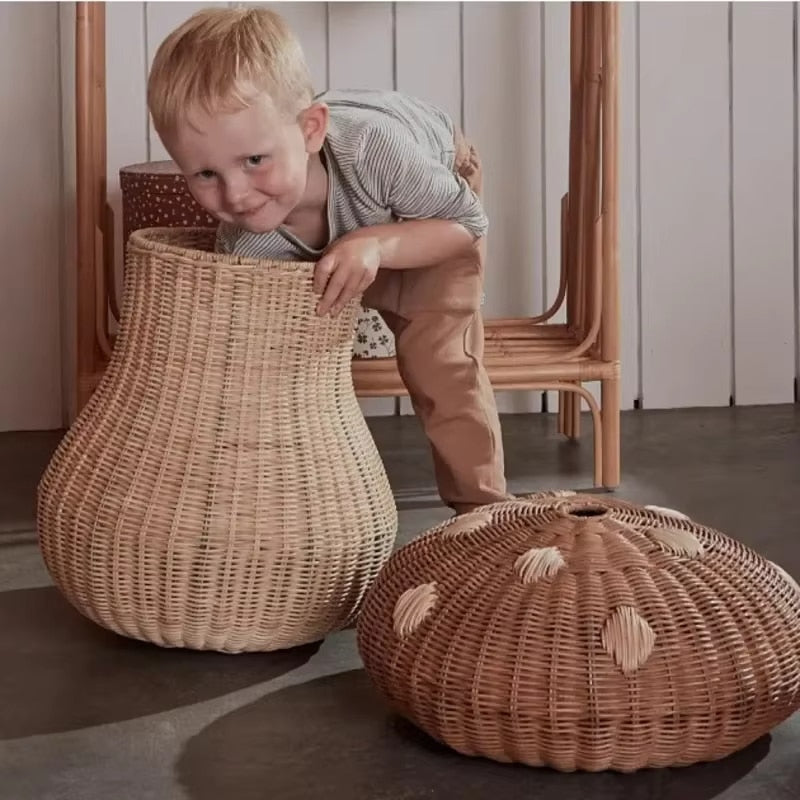 Mushroom-shaped handwoven rattan storage basket – shown in use