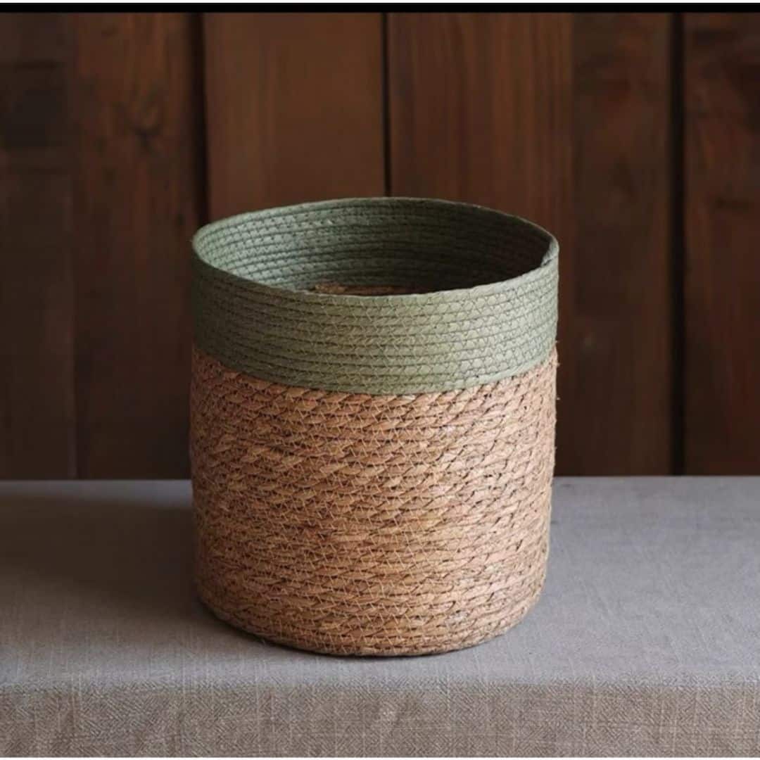 Modern handwoven rattan basket with a bold green rim