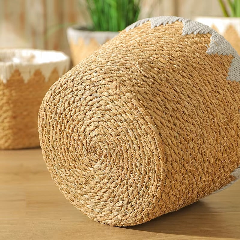 Round handwoven rattan basket with a white geometric pattern – close-up detail