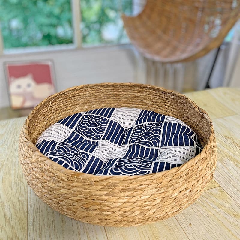 Handwoven natural rattan blanket basket – with cushion variant, another view