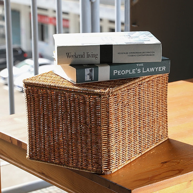 Large handwoven storage basket with a fitted lid – shown in a room setting (3)