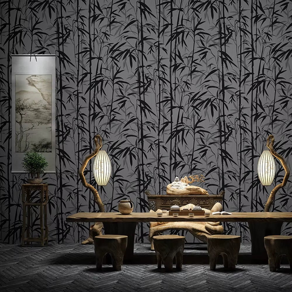 Dark night-effect bamboo wallpaper with light stems – shown in a room setting