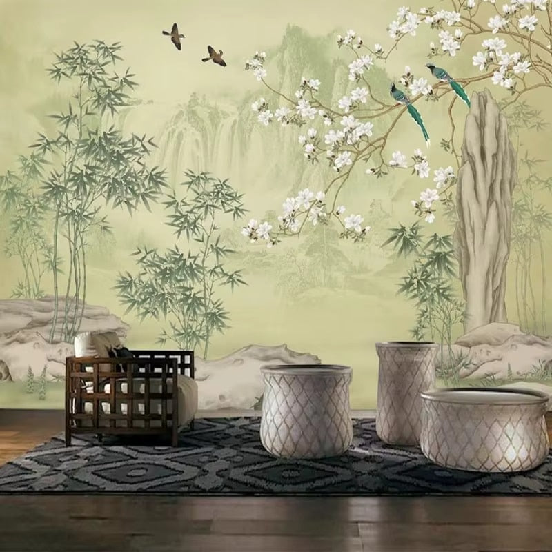 Wallpaper with bamboo stems, magnolia blooms and birds – shown in a room setting