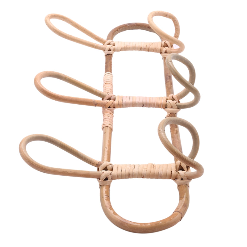 Light rattan round wall rack with three hooks – close-up detail