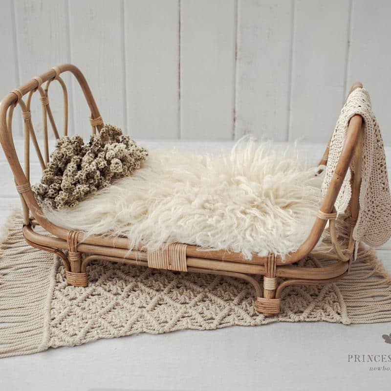 Small openwork rattan baby bed